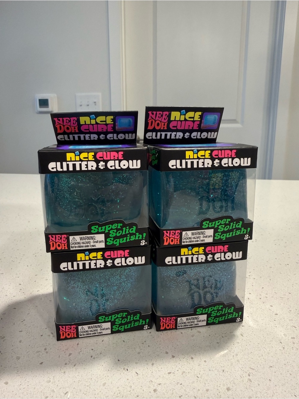 Needoh Nice Cube Glitter & Glow Blue Squishy Toy - 4 Pack